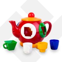قوری قرمزی توری تک توی